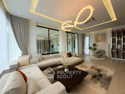 Luxurious modern living room with elegant lighting and spacious seating area