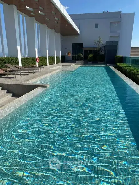 Luxurious rooftop pool with modern design and stunning views, perfect for relaxation and leisure.