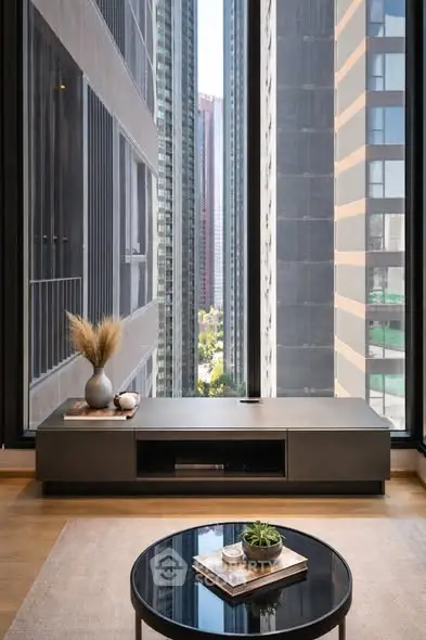 Modern living room with stunning city view and sleek furniture