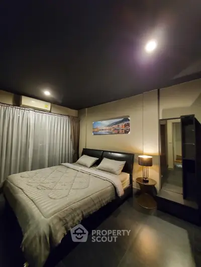 Cozy bedroom with modern decor and ambient lighting