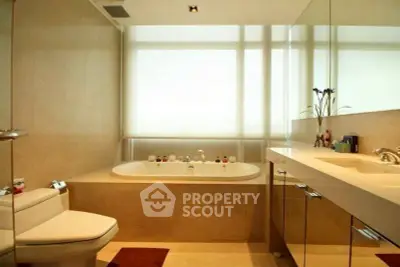 Luxurious modern bathroom with elegant fixtures and large bathtub