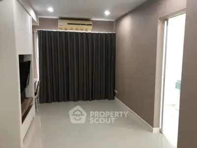 Modern living room with air conditioning and sleek design
