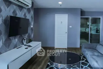 Modern living room with stylish decor and open kitchen layout