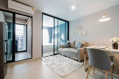 Modern living room with cozy decor and open layout in stylish apartment