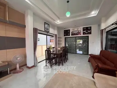 Spacious living room with elegant dining area and modern decor