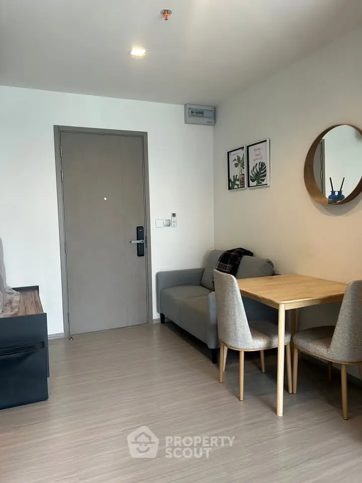 Modern living room with cozy dining area and stylish decor