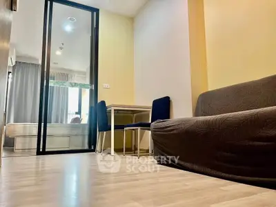 Modern apartment interior with cozy living area and stylish furniture