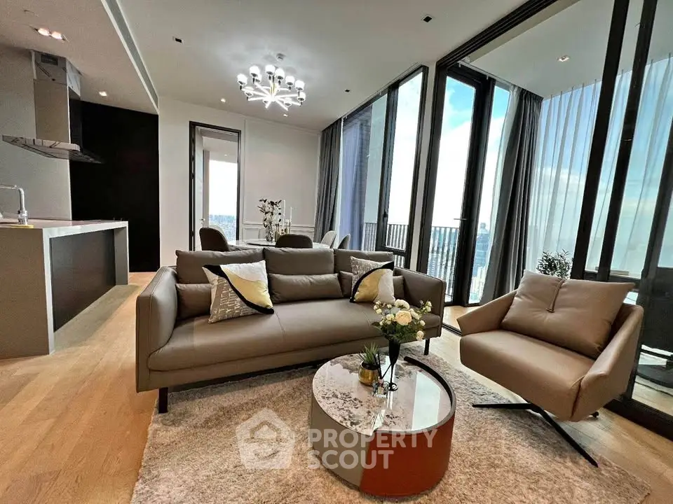 Luxurious modern living room with floor-to-ceiling windows and stunning city view.