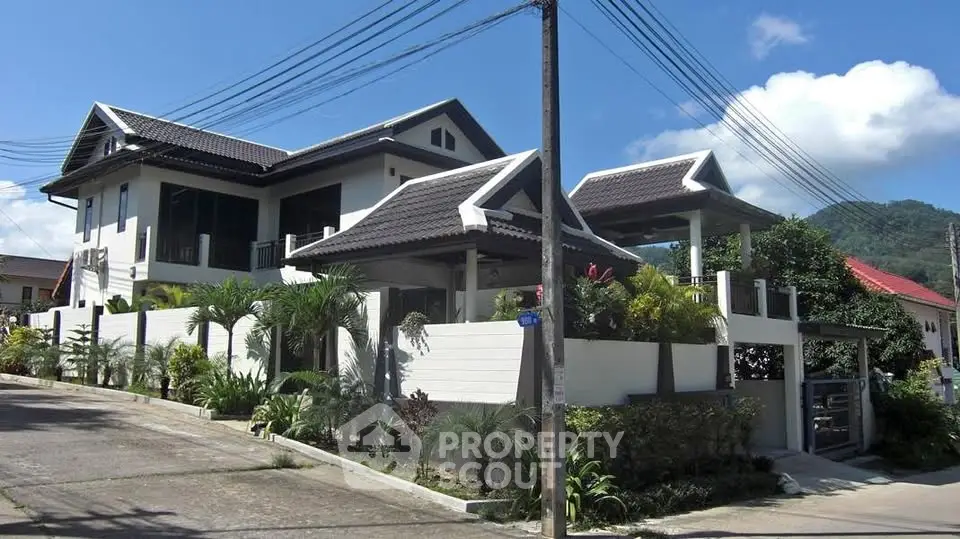 Stunning modern house with lush garden and mountain views