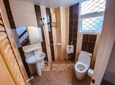 Modern bathroom with sleek fixtures and stylish tile design