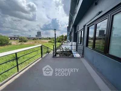 Spacious balcony with scenic view in modern building