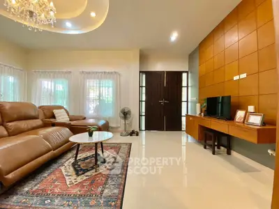Spacious living room with elegant leather sofas and modern decor