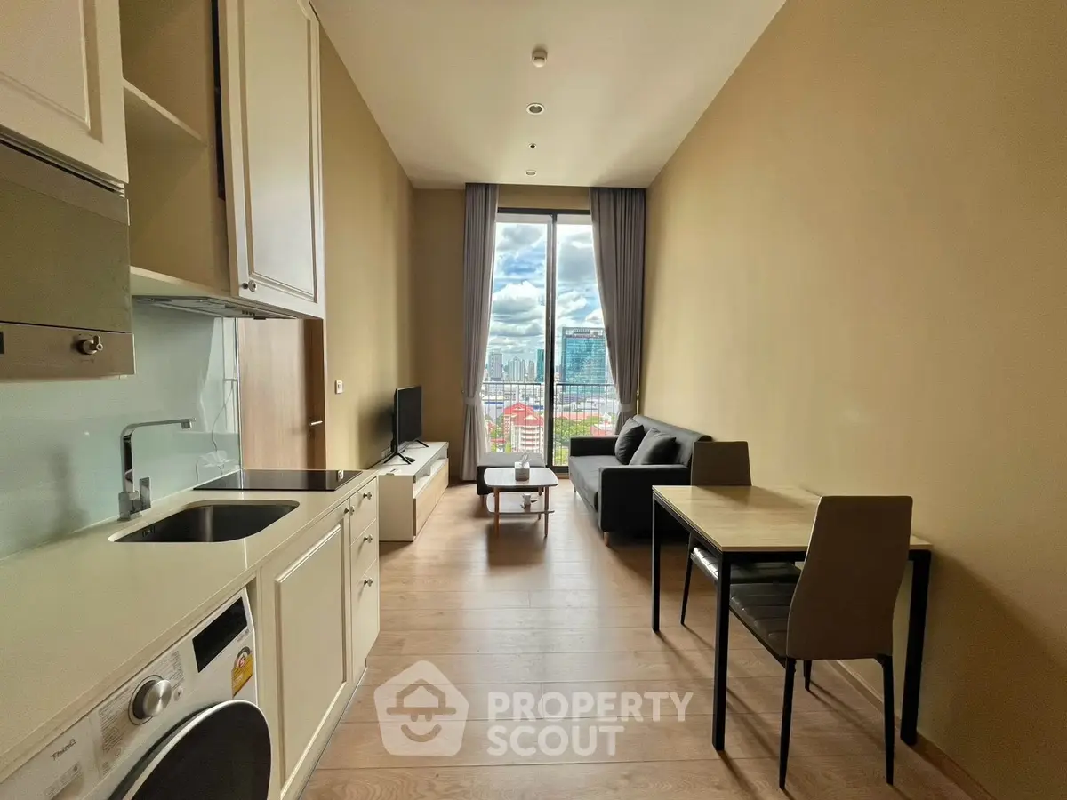 Modern studio apartment with open kitchen and stunning city view