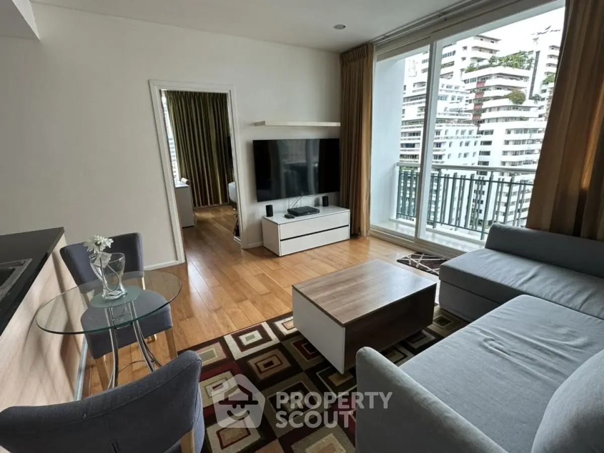 Modern living room with balcony view in urban apartment