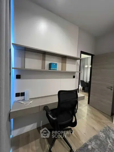 Modern study room with sleek desk and ergonomic chair