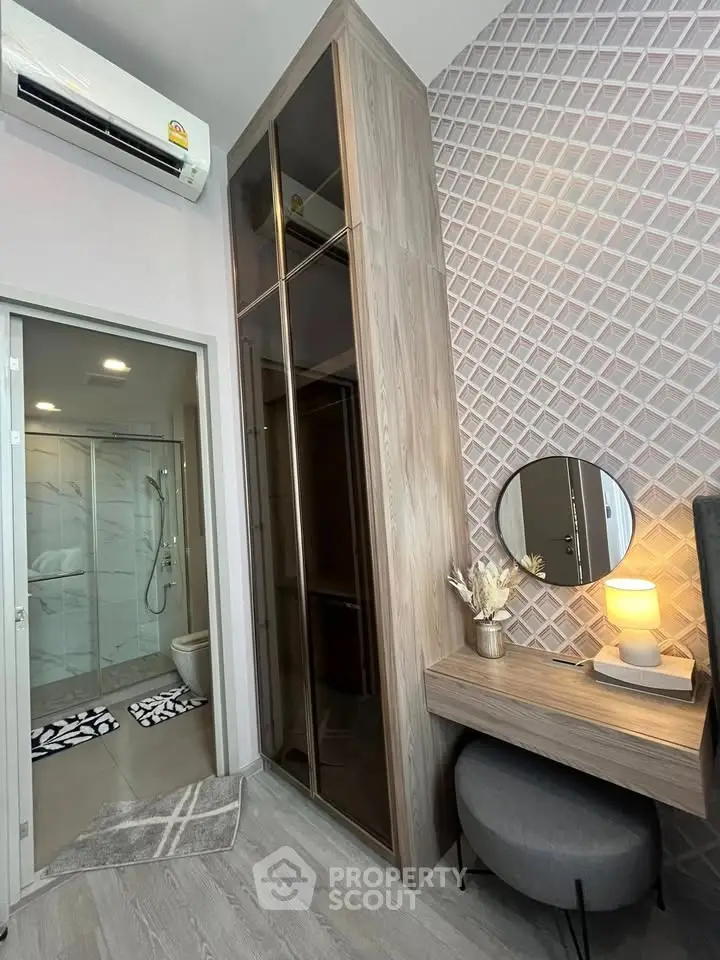 Modern bedroom with stylish decor and ensuite bathroom