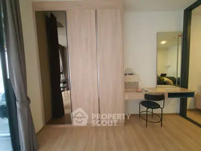 Modern bedroom with wooden wardrobe and stylish desk