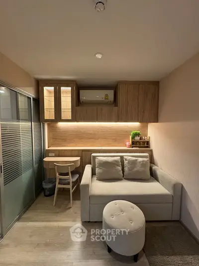 Cozy modern living room with compact design and stylish furniture