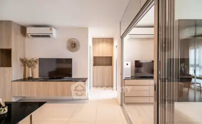 Modern living room with sleek design and dual air conditioning units