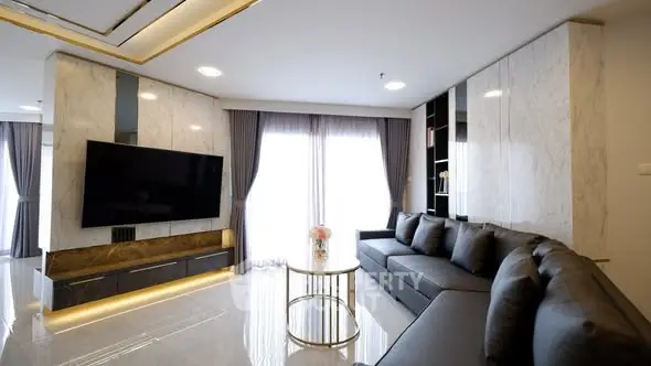 Luxurious modern living room with sleek design and elegant furnishings.
