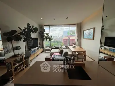 Modern living room with stunning city view, elegant decor, and open layout for stylish urban living.