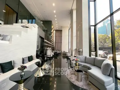 Luxurious modern living room with high ceilings and elegant decor