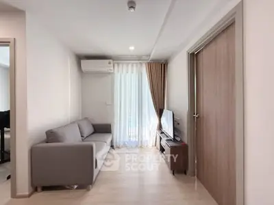 Modern living room with sleek design and natural light