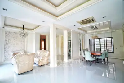 Spacious living room with elegant dining area and luxurious furnishings