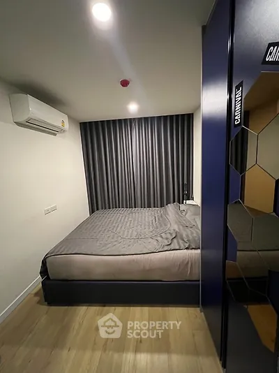 Modern bedroom with sleek design and cozy ambiance