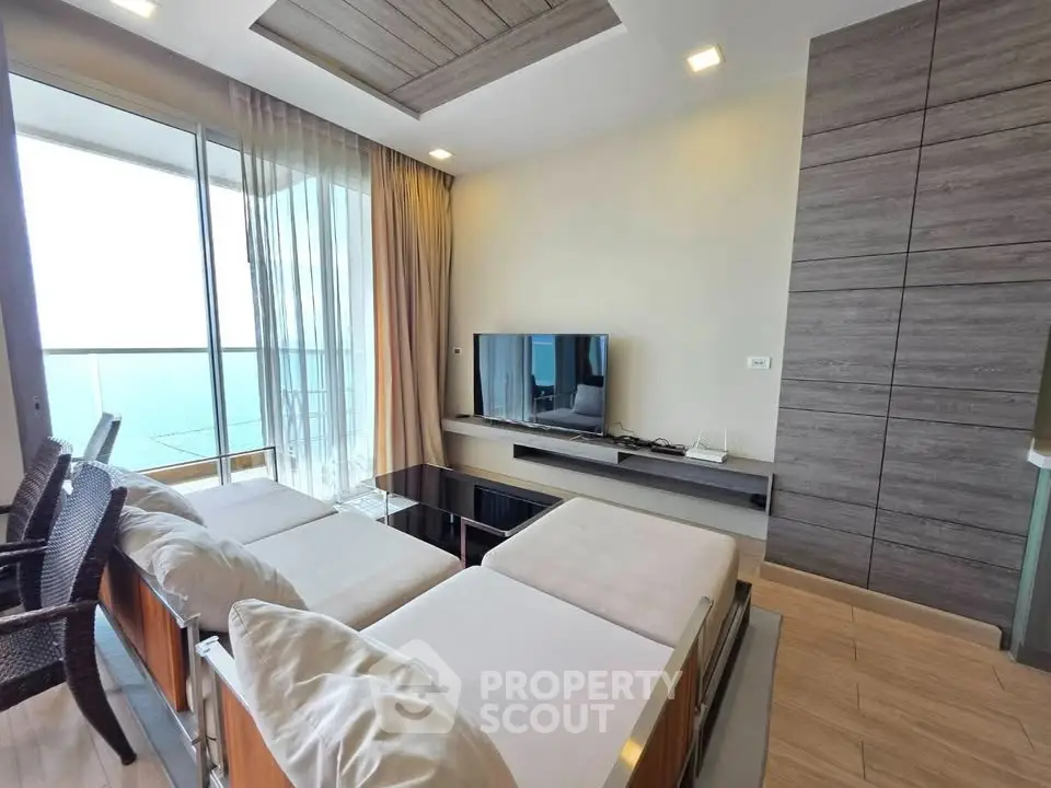 Modern living room with ocean view and stylish furniture
