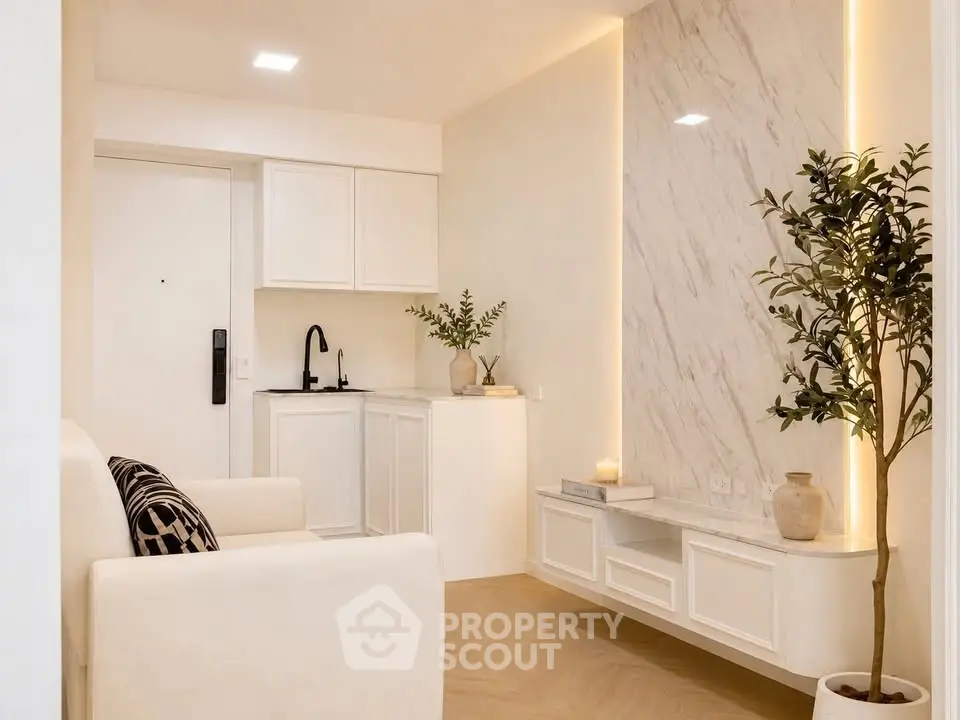Elegant modern living room with marble accent wall and cozy seating area