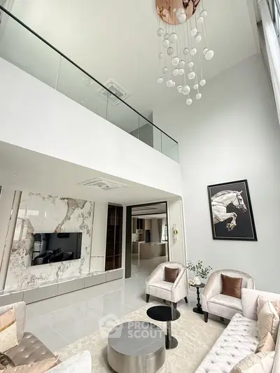 Luxurious modern living room with high ceiling and elegant decor