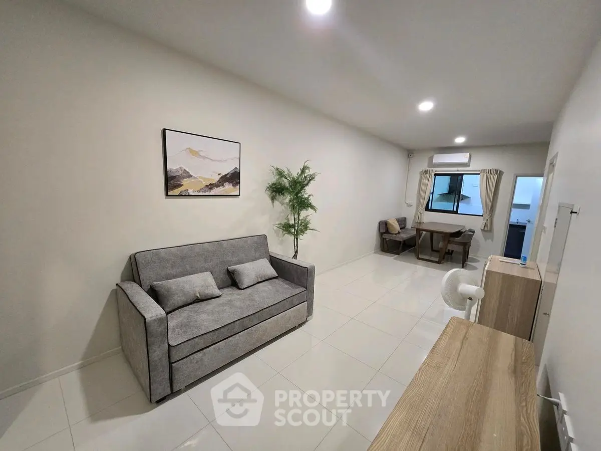 Modern living room with sleek furniture and minimalist decor
