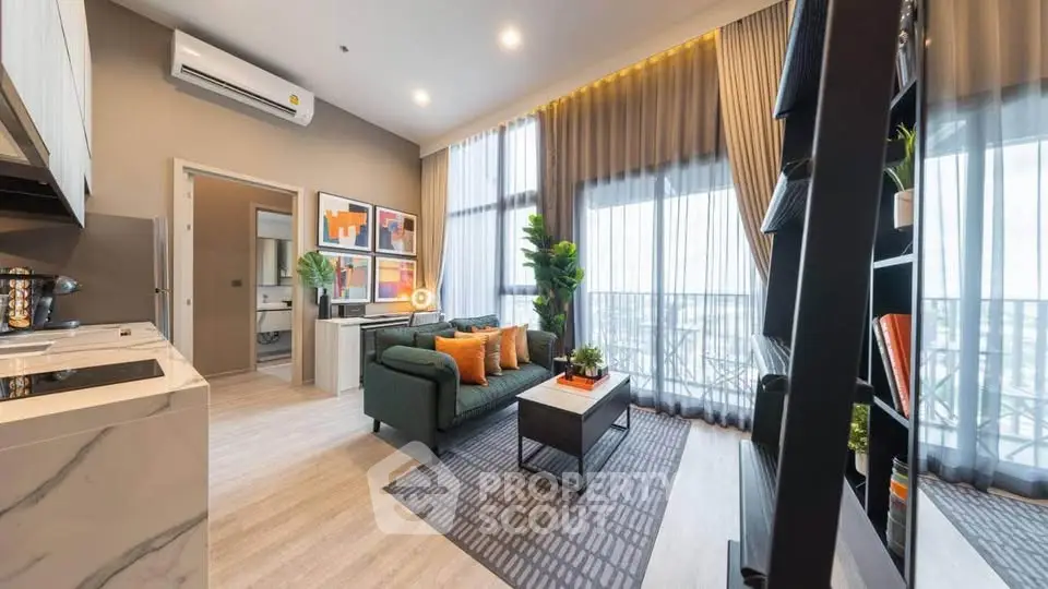 Modern living room with high ceilings and stylish decor in a luxury apartment.