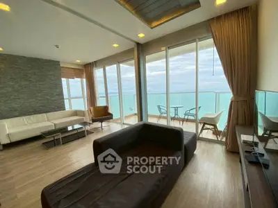 Luxurious living room with ocean view and modern furnishings