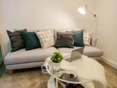 Cozy living room with stylish sofa and modern decor