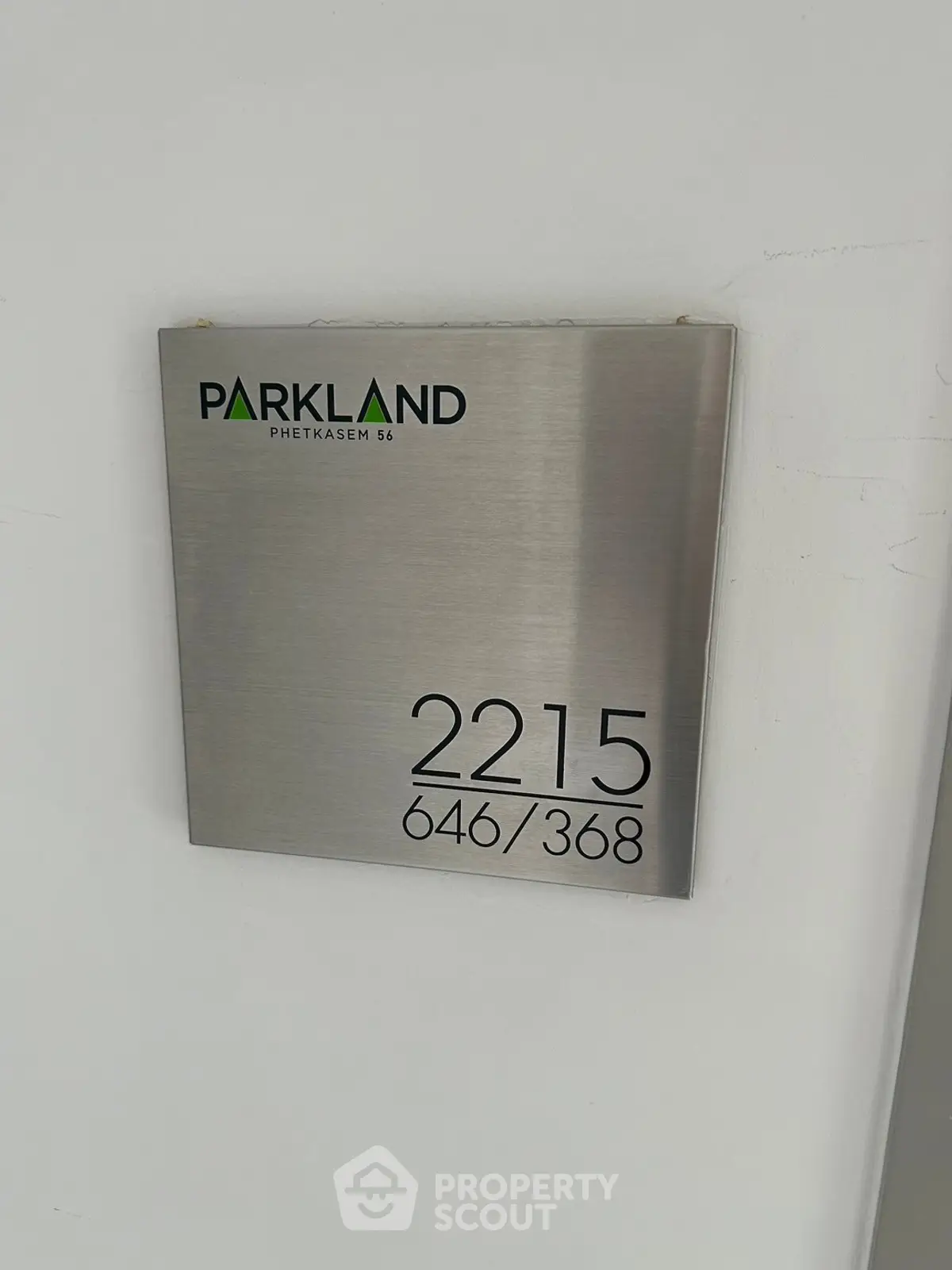 Modern apartment number sign with sleek design at Parkland Phetkasem 56.