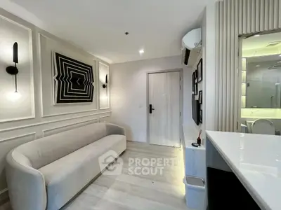 Modern living room with stylish decor and cozy seating area