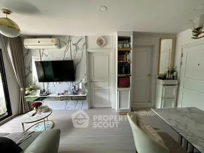 Stylish modern living room with marble accents and elegant decor