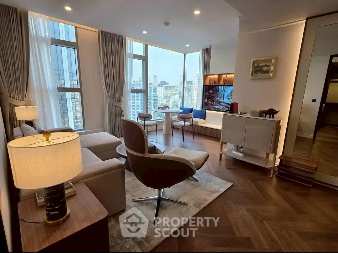 Luxurious living room with city view, elegant decor, and modern furniture in high-rise apartment.