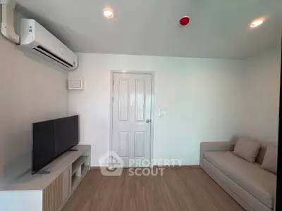 Modern living room with air conditioning and minimalist furniture