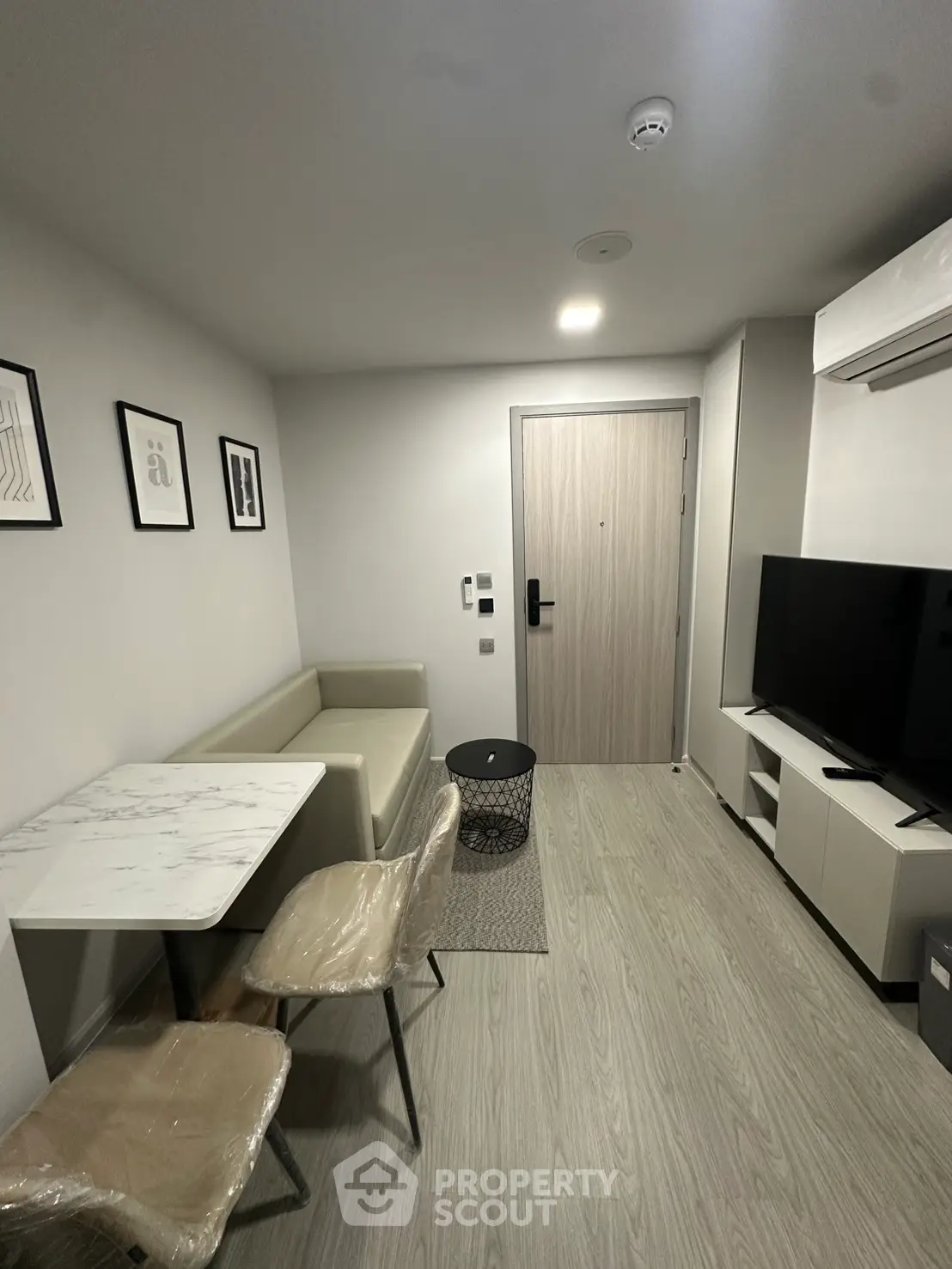 Modern living room with sleek furniture and minimalist decor