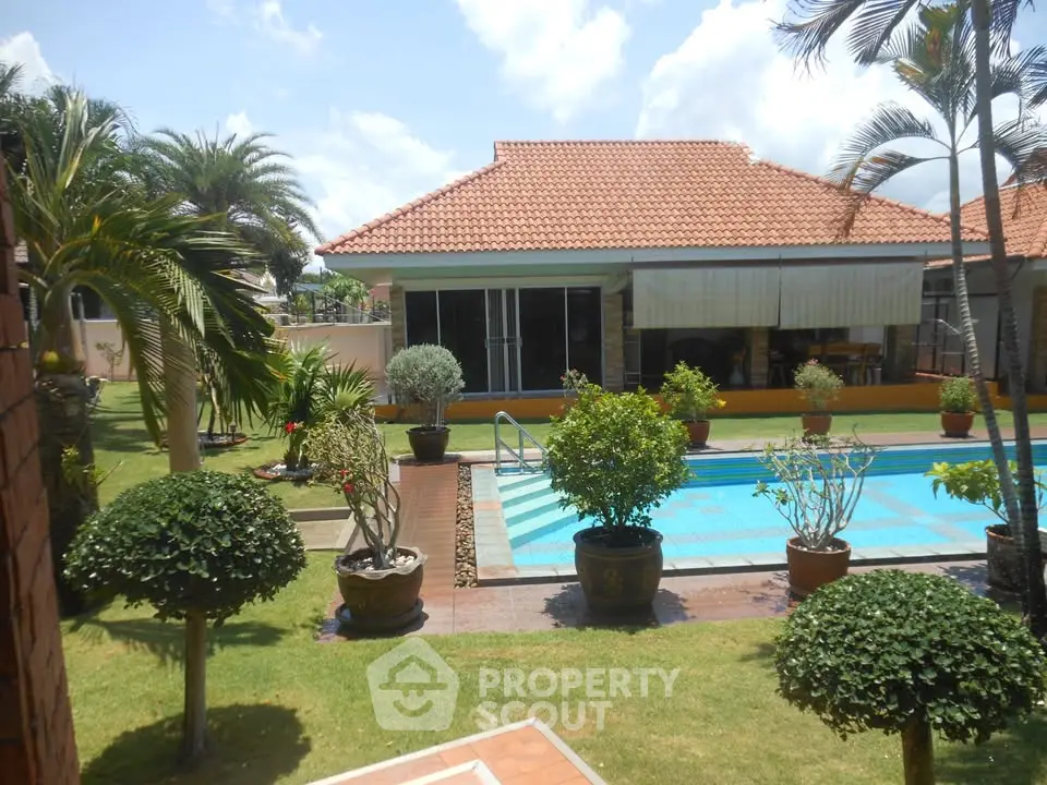 Luxurious villa with private pool and lush garden, perfect for serene living.