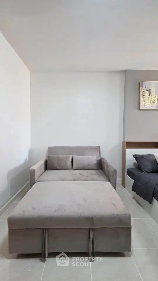 Modern living room with stylish sofa bed and minimalist decor
