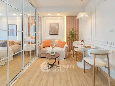 Chic modern living room with cozy seating and elegant dining area, perfect for urban living.