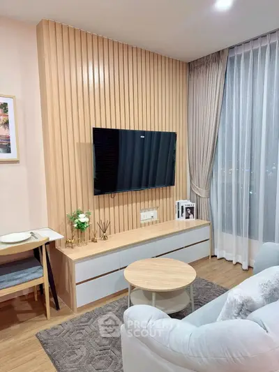 Modern living room with sleek TV setup and elegant decor