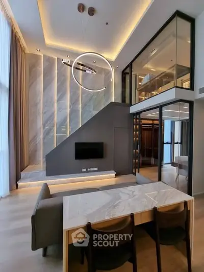 Luxurious modern living room with high ceilings and stylish mezzanine