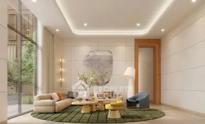 Luxurious modern living room with elegant furniture and large windows offering natural light.