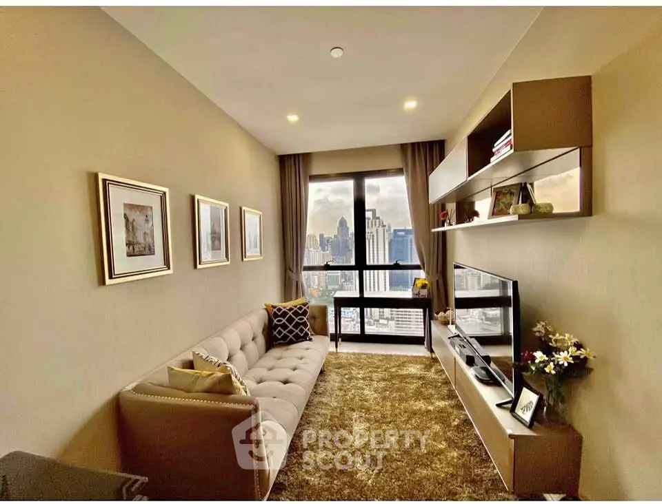Stylish living room with city view, featuring modern decor and large windows for natural light.