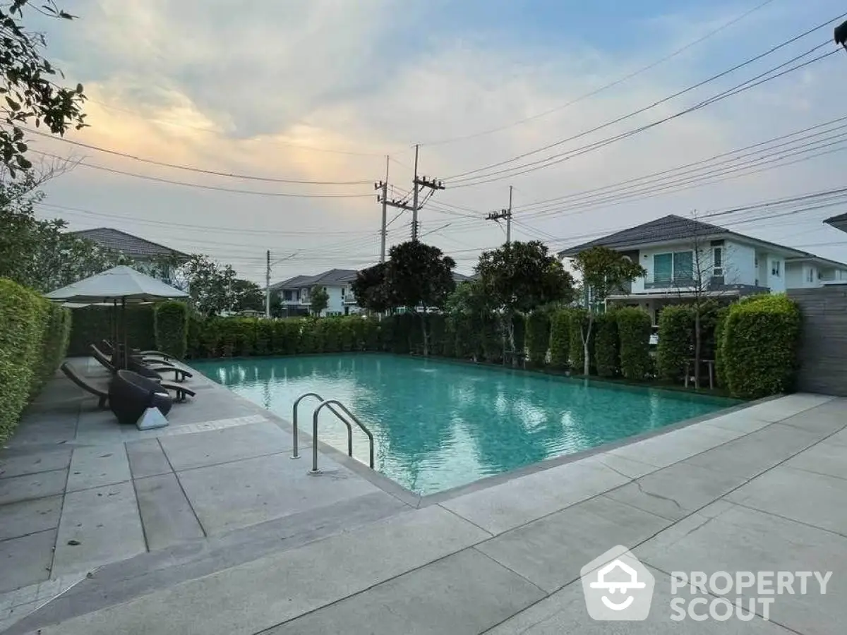 Luxurious residential pool area with serene ambiance and modern design